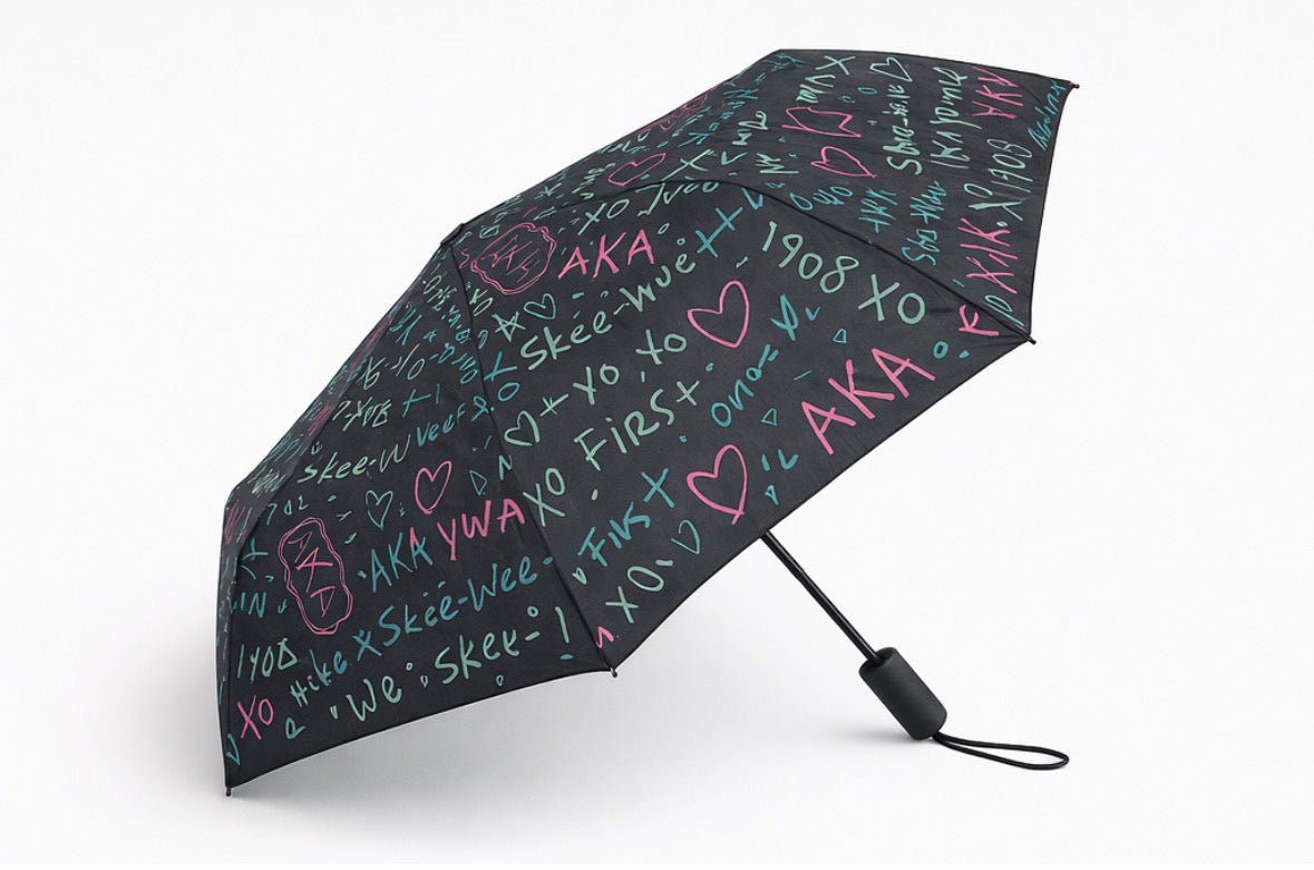 AKA Graffiti Umbrella with black canopy and pink and green lettering