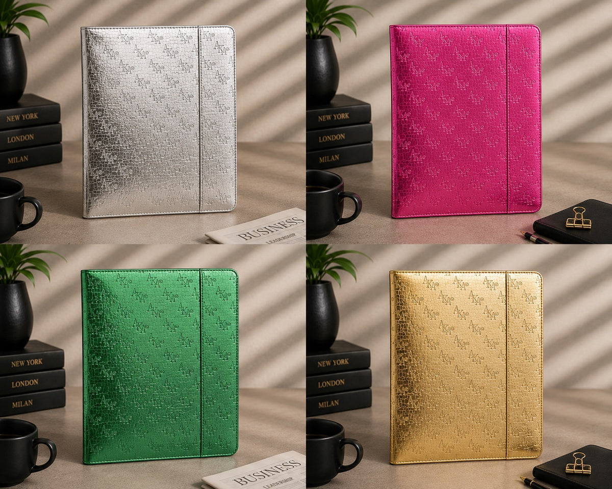 Reflection Padfolio closed exterior views in silver, pink, green, and gold.